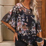 Bluse mit floralen und asymmetrischen Silhouetten - kleiderkultausberlin